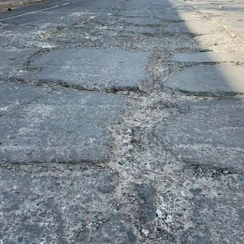 从江路面起砂露石子修补料